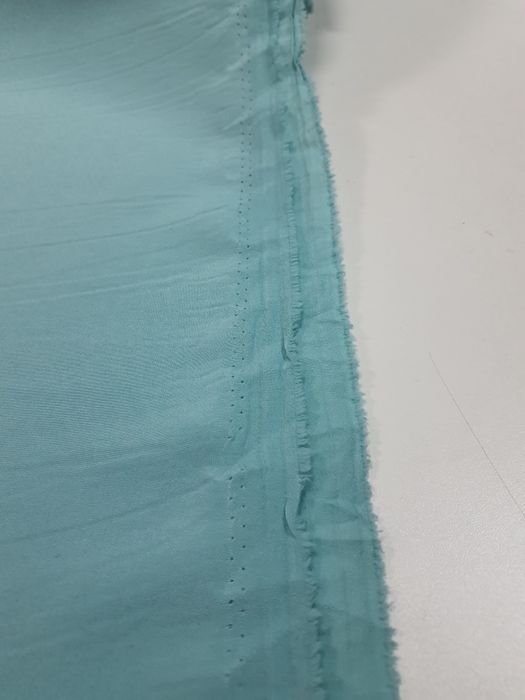 Podszewka jasna niebieska szer.152 cm.