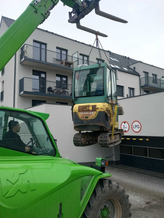 Kret przeciski pod drogami usługi koparką Września Gniezno  Słupca