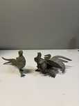Aves em metal