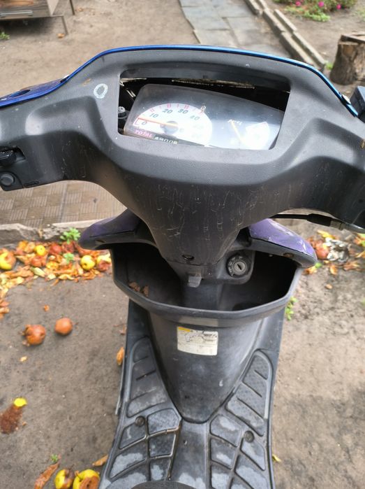 Скутер Suzuki синій