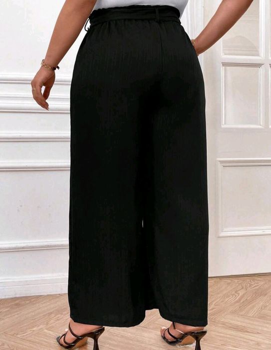Nowe spodnie materiałowe r. 0XL