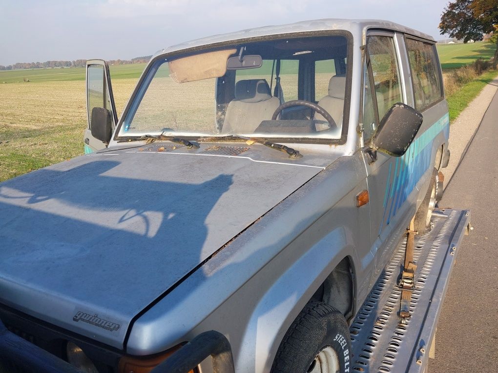 Isuzu trooper I 2.6 benzyna na części silnik skrzynia drzwi most