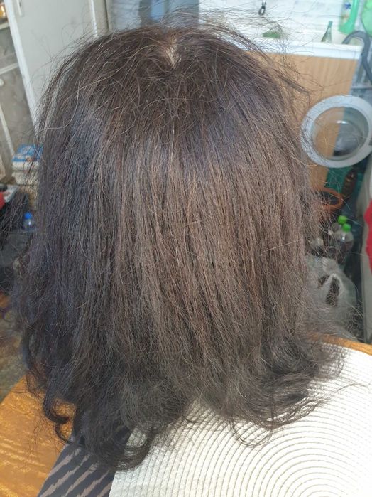 Glowa fryzjerska z uchwytem marki Calissimo.