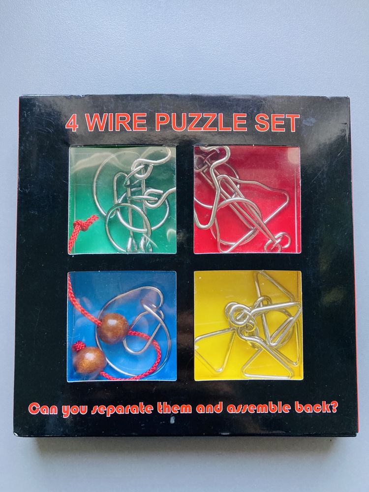 4 wire puzzle set . Puzzle metalowe