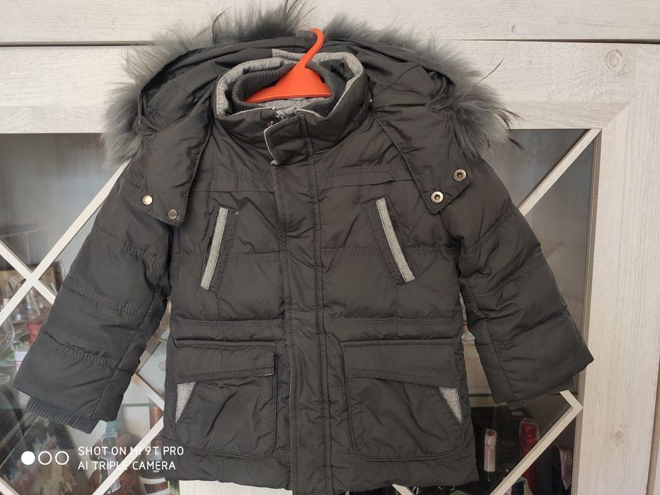 Продам зимний пуховик на мальчика.