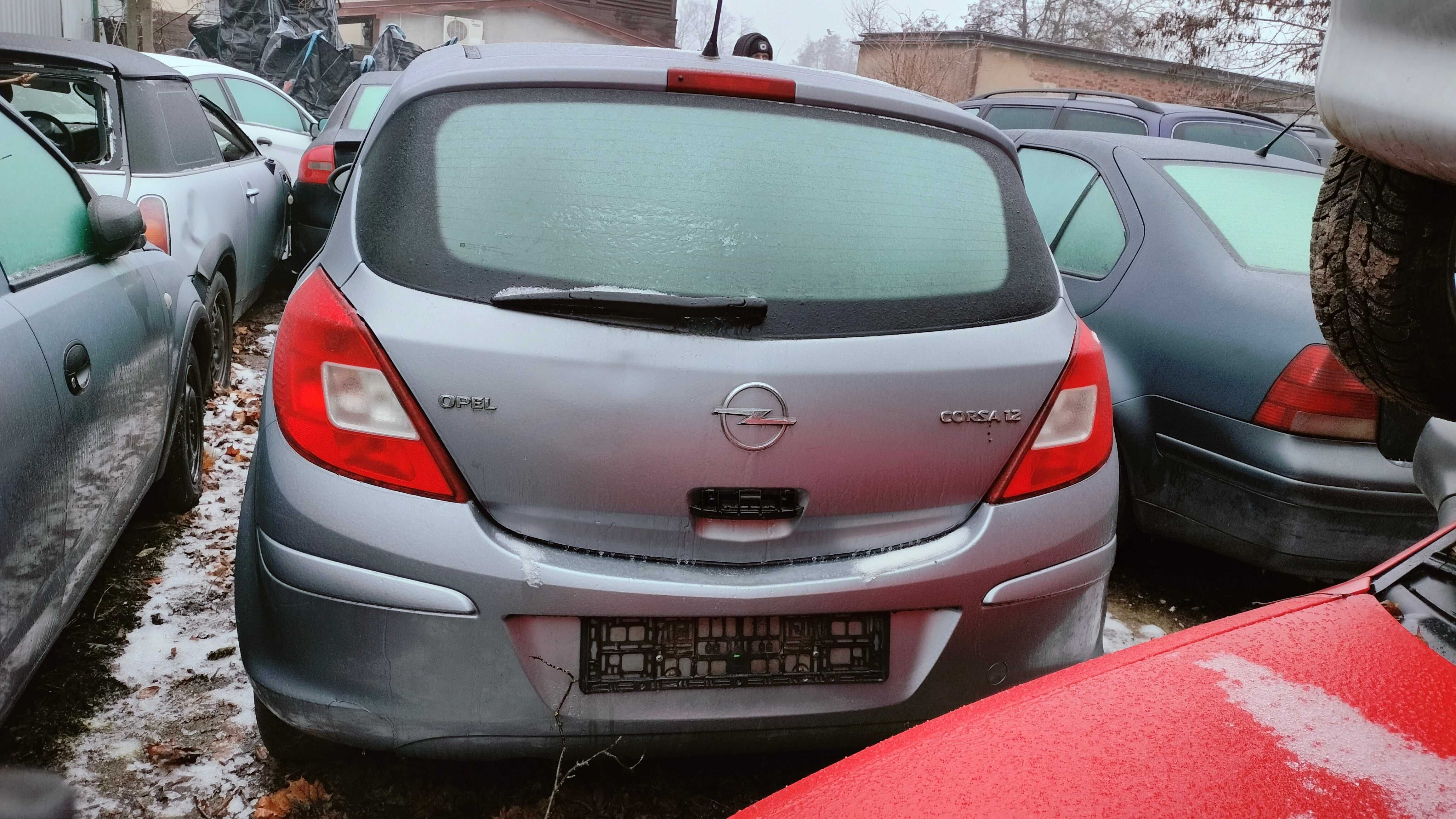 Opel Corsa D silnik 1.3  drzwi zderzak tył reflektor lampy tył części