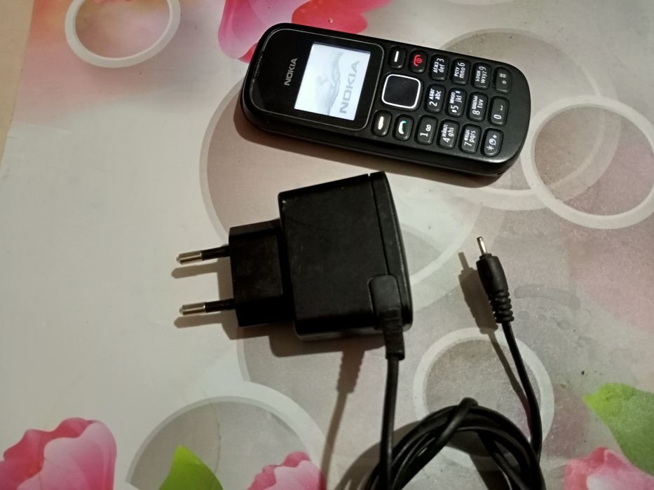 Продам кнопочный телефон от Нокия 1280 черный.