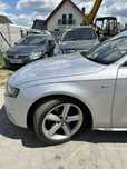 BŁOTNIK LEWY PRAWY AUDI A4 2011
