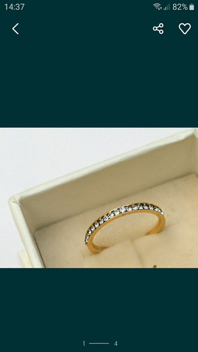 Anéis dourado e prateado em aço