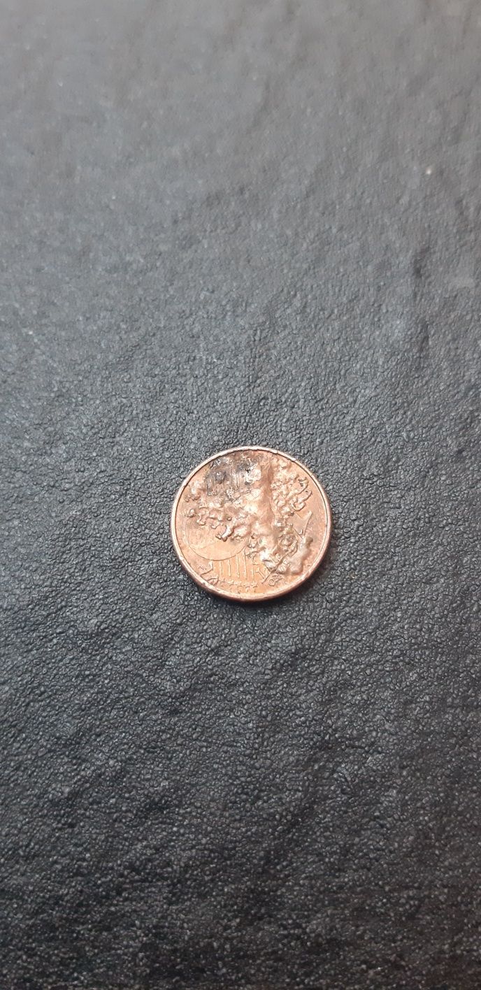 Vendo estas moedas de 1 e 2 cêntimos tem uma de 1 cêntimo com defeito