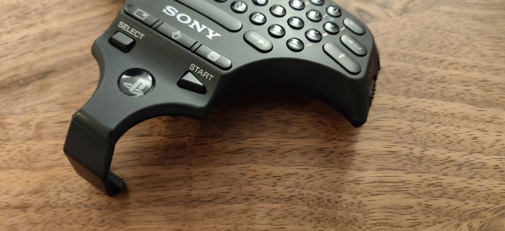 Teclado + telecomando Playstation