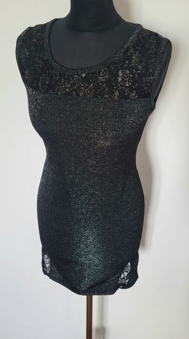 Nowa przepiękna dopasowana sukienka damska bez rękawów mieniąca sie