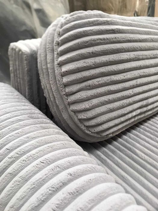 Wyjątkowa welurowa sofa w kolorze szarym z funkcją spania