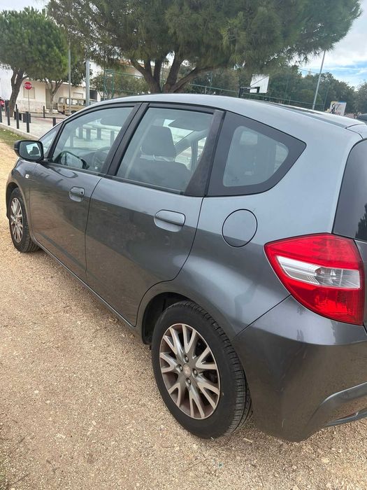 Honda Jazz, muito estimado, baixa kilometragem
