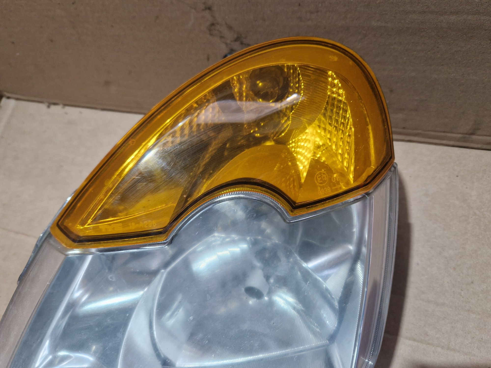 Lampa reflektor lewa lewy przód przedni Renault Modus Europa