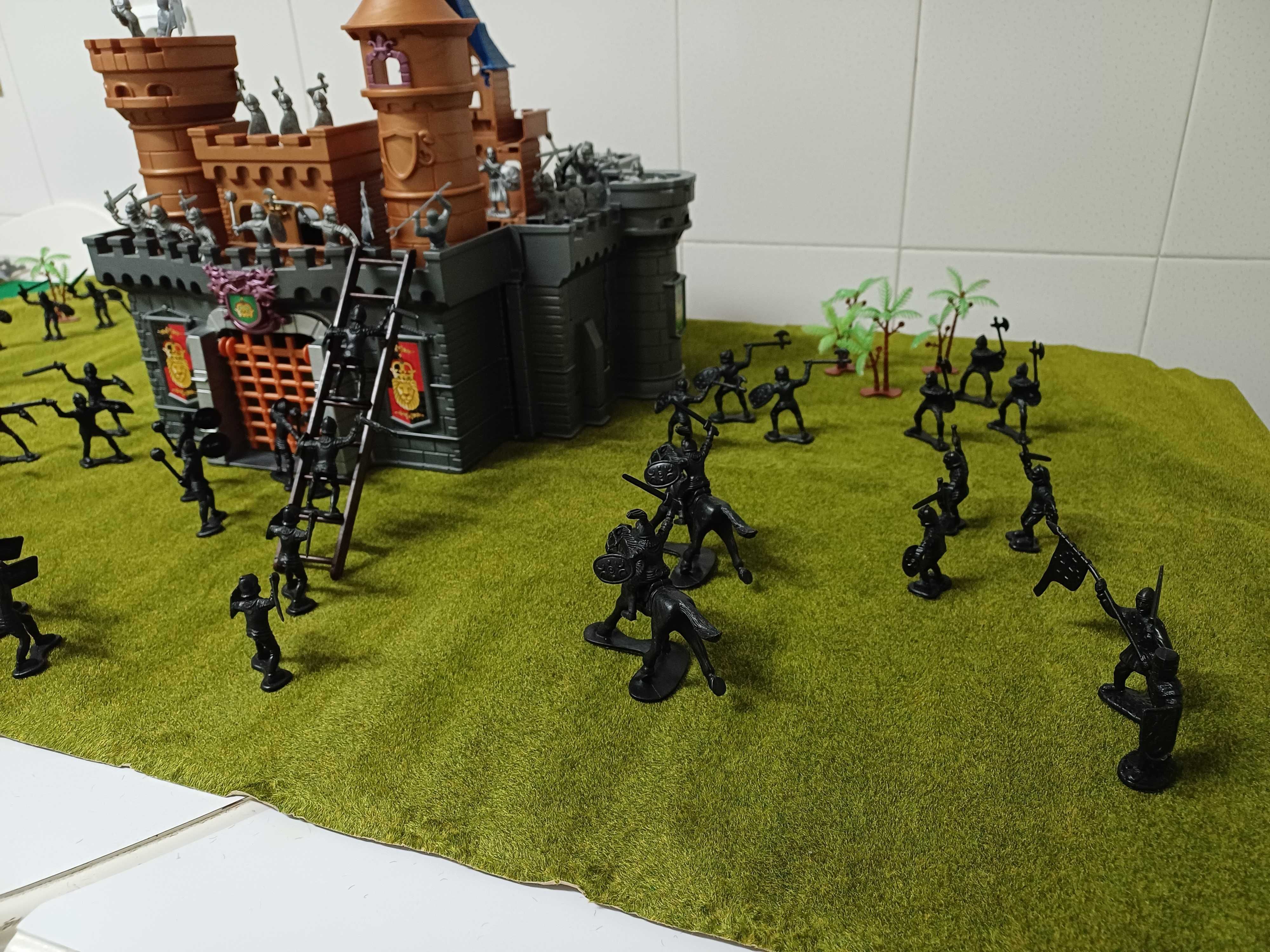 Castelo com exércitos em guerra