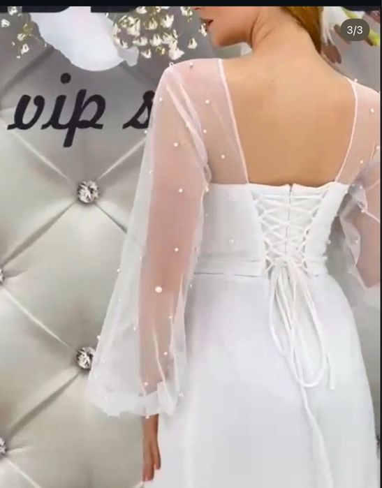 Весільна сукня з гарною спинкою