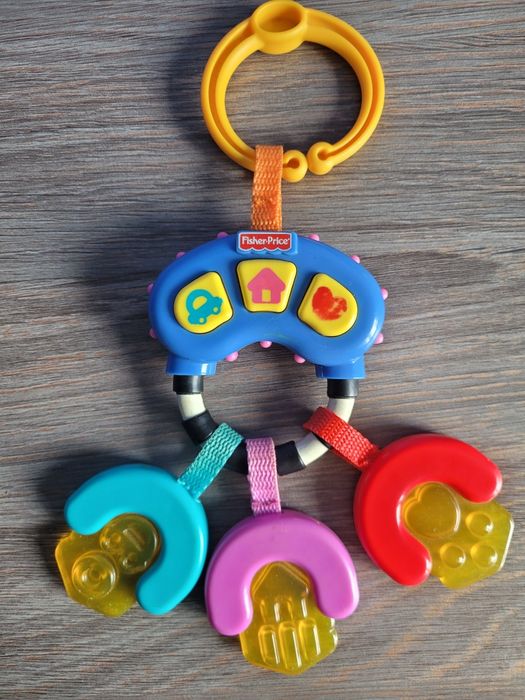 Дитяча іграшка на коляску