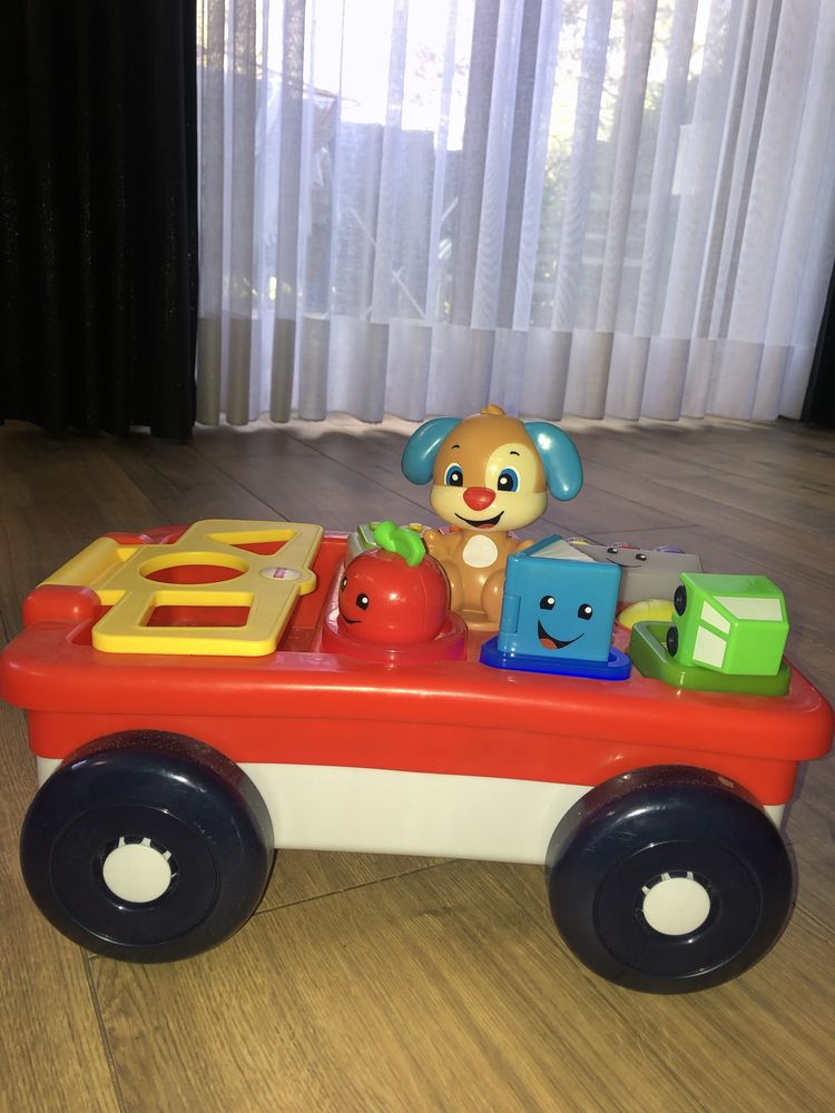 Fisher-price edukacyjny wózek szczeniaka