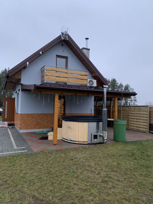 Domek całoroczny nad jeziorem z balią.