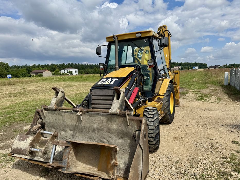 Cat 428d premier biegow koparko ładowarka caterpillar 428 432
