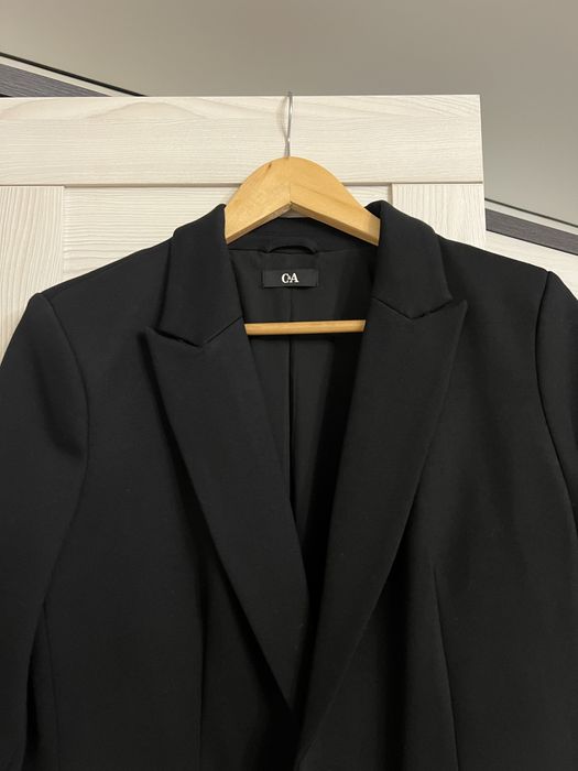 Піджак чорний подовжений може бути як оверсайз