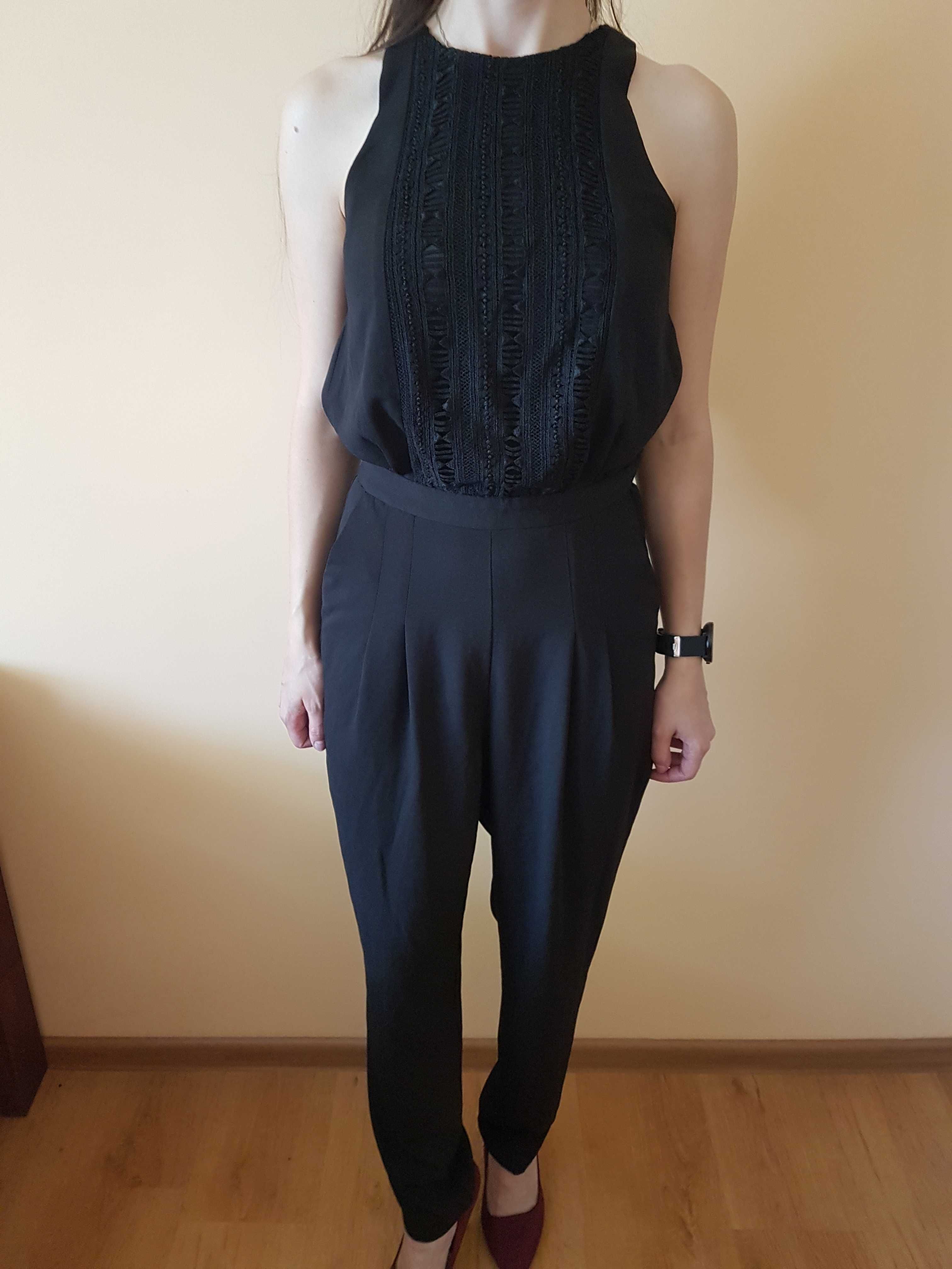 Czarny kombinezon H&M