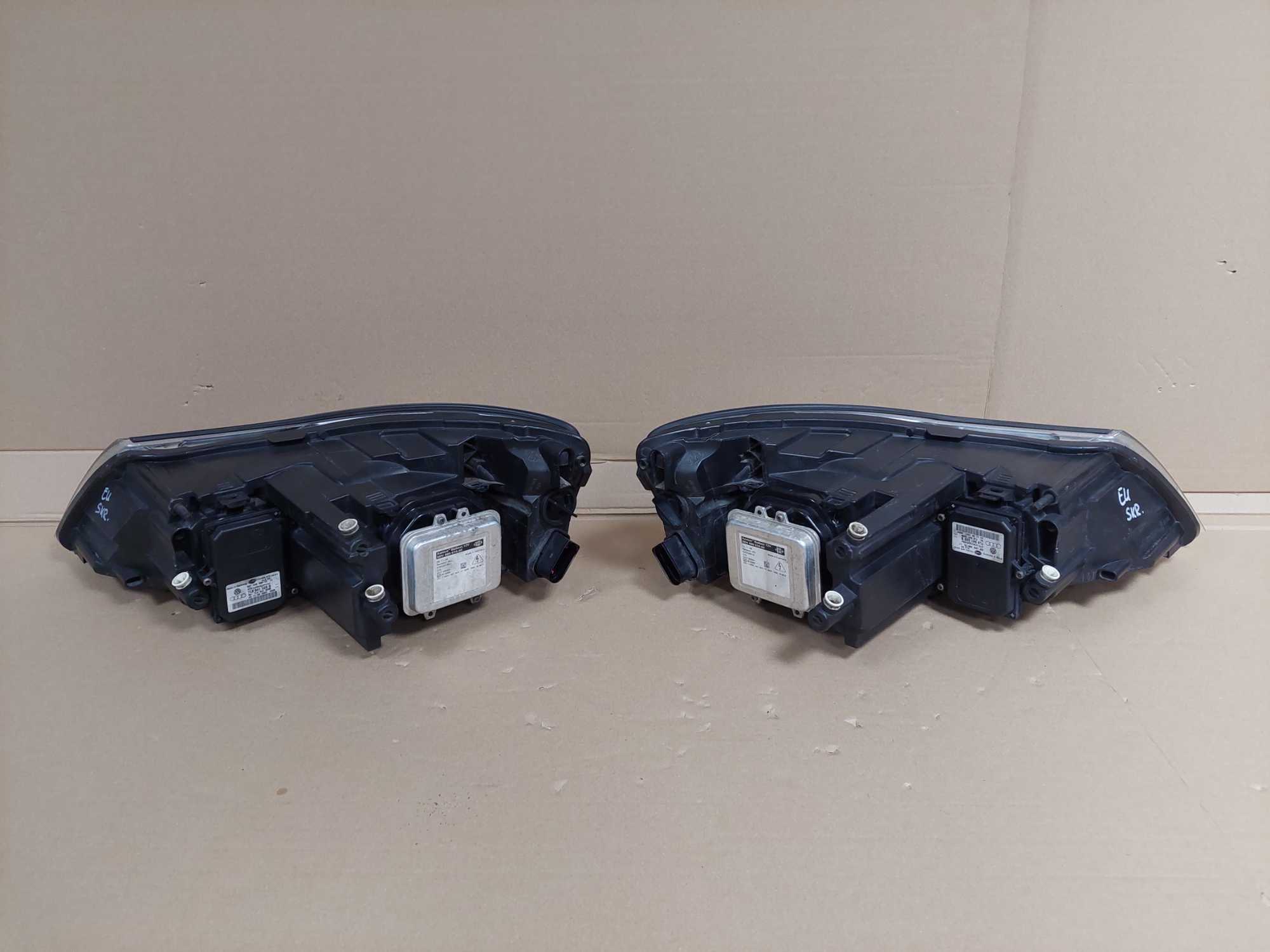Octavia 2 II LIFT 08-12r lampa przód Bi Xenon skrętny lewa KPL EU BDB