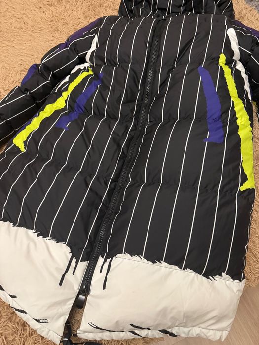 Зимовий довгий пуховик