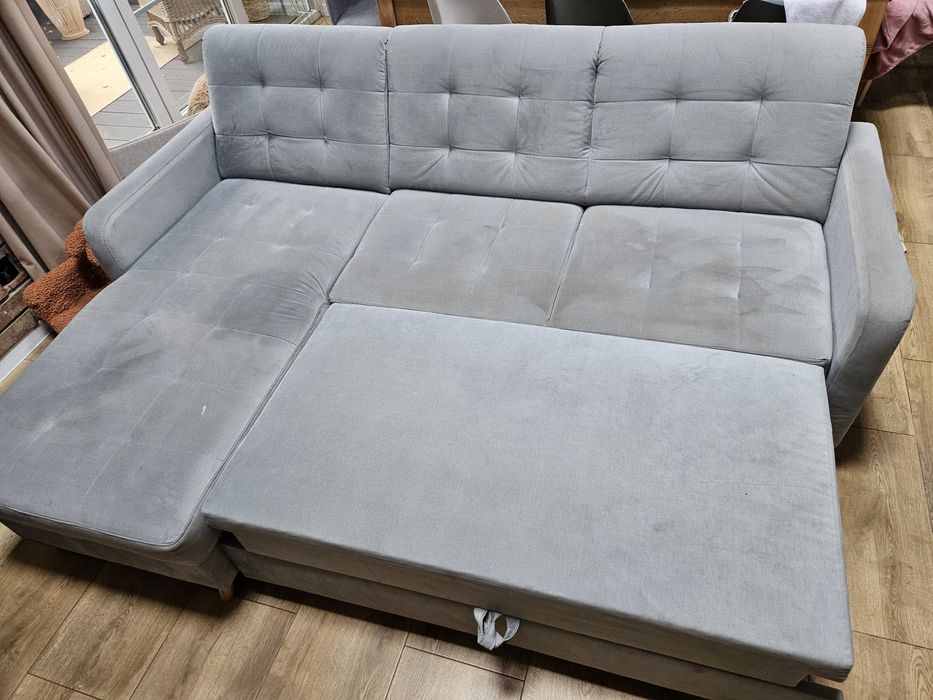 Narożnik z funkcją spania Agata Meble kanapa sofa kolor miętowy zielon