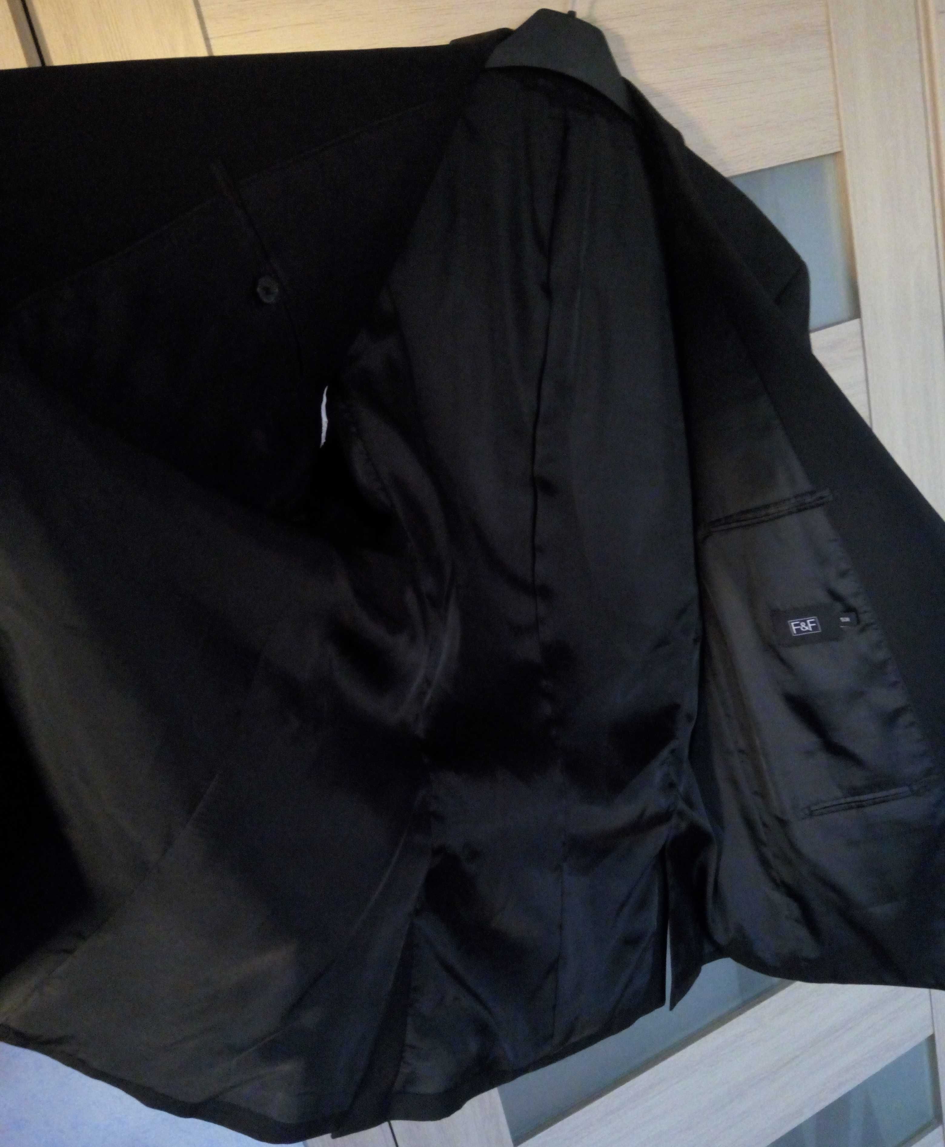 Чорний чоловічий піджак на об'єм грудей 127см