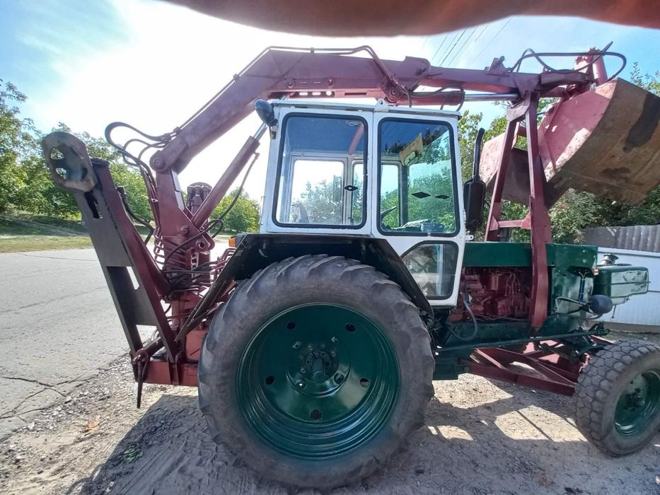 Грейферний погрузчик юмз