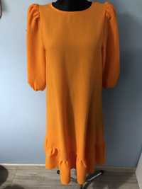 Piękna pomarańczowa sukienka z bufkami