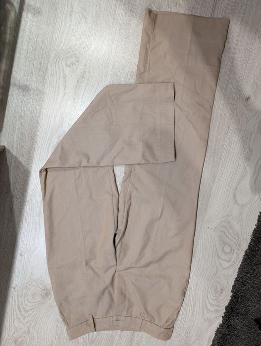 Eleganckie spodnie z szerokimi nogawkami Monki