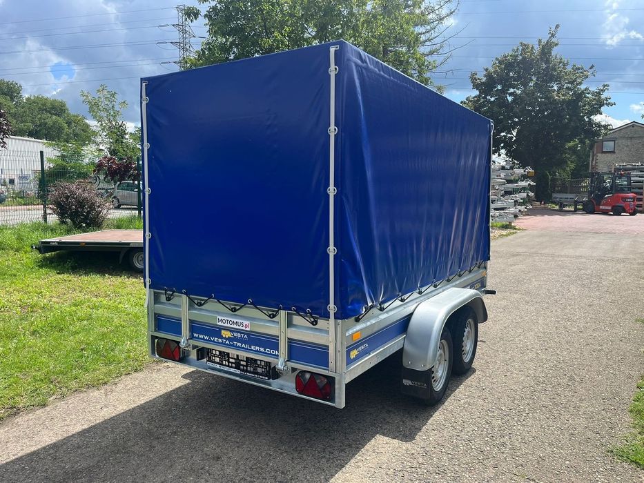 Przyczepa VESTA LIGHT 30DA 300x150x37 cm z plandeka 2 osie dwuosiowa DMC 750 kg  spawana rama MOTOMUS CZĘSTOCHOWA  Przyczepa VESTA LIGHT 30DA 300x150x37 cm z plandeka 2 osie dwuosiowa