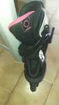 Patins em linha marca Oxelo,estado novo,cor preto com branco e rosa,