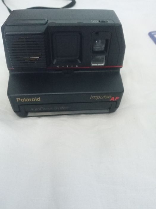 Máquina fotográfica poloroid impulso