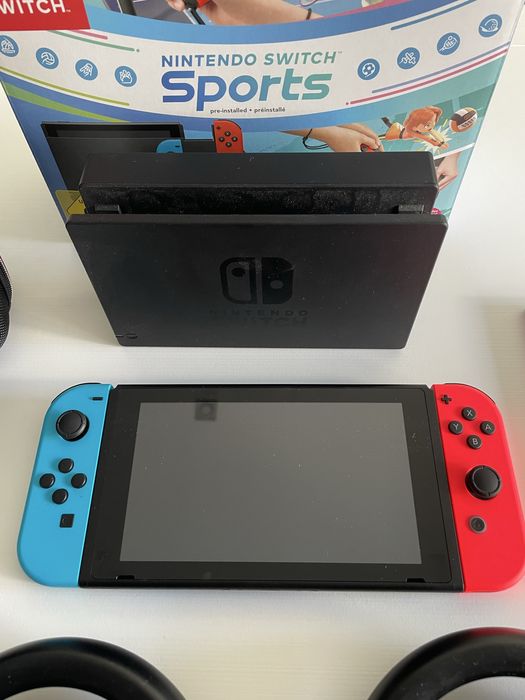 Nintendo Switch c/ 3 jogos, 4 comandos e bolsa transporte