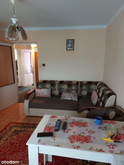 Sprzedam mieszkanie 3 pokojowe z garażem i działką.