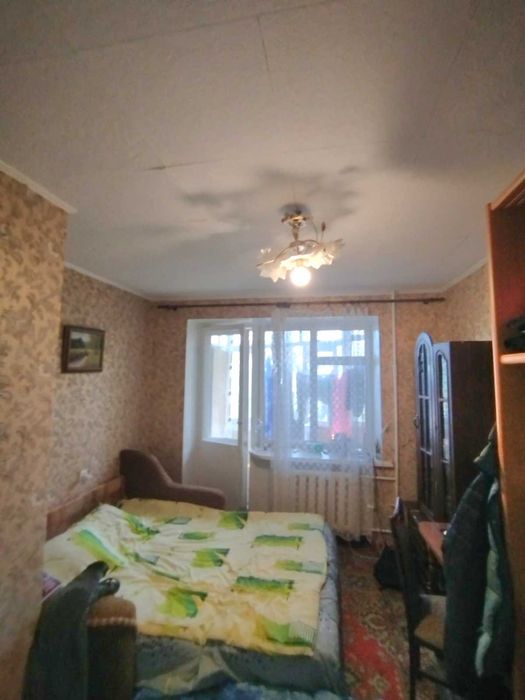 Недорого 1-комнатная Гостинка в жилом состоянии на ул.Королева