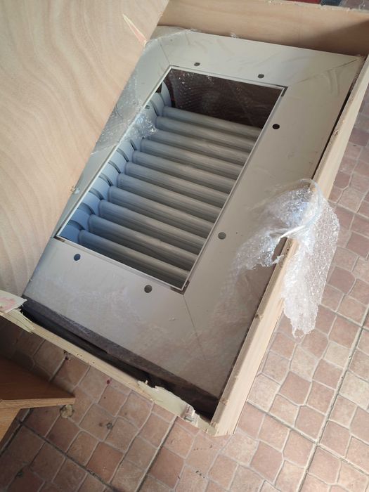 Escada de alumínio dobrável.