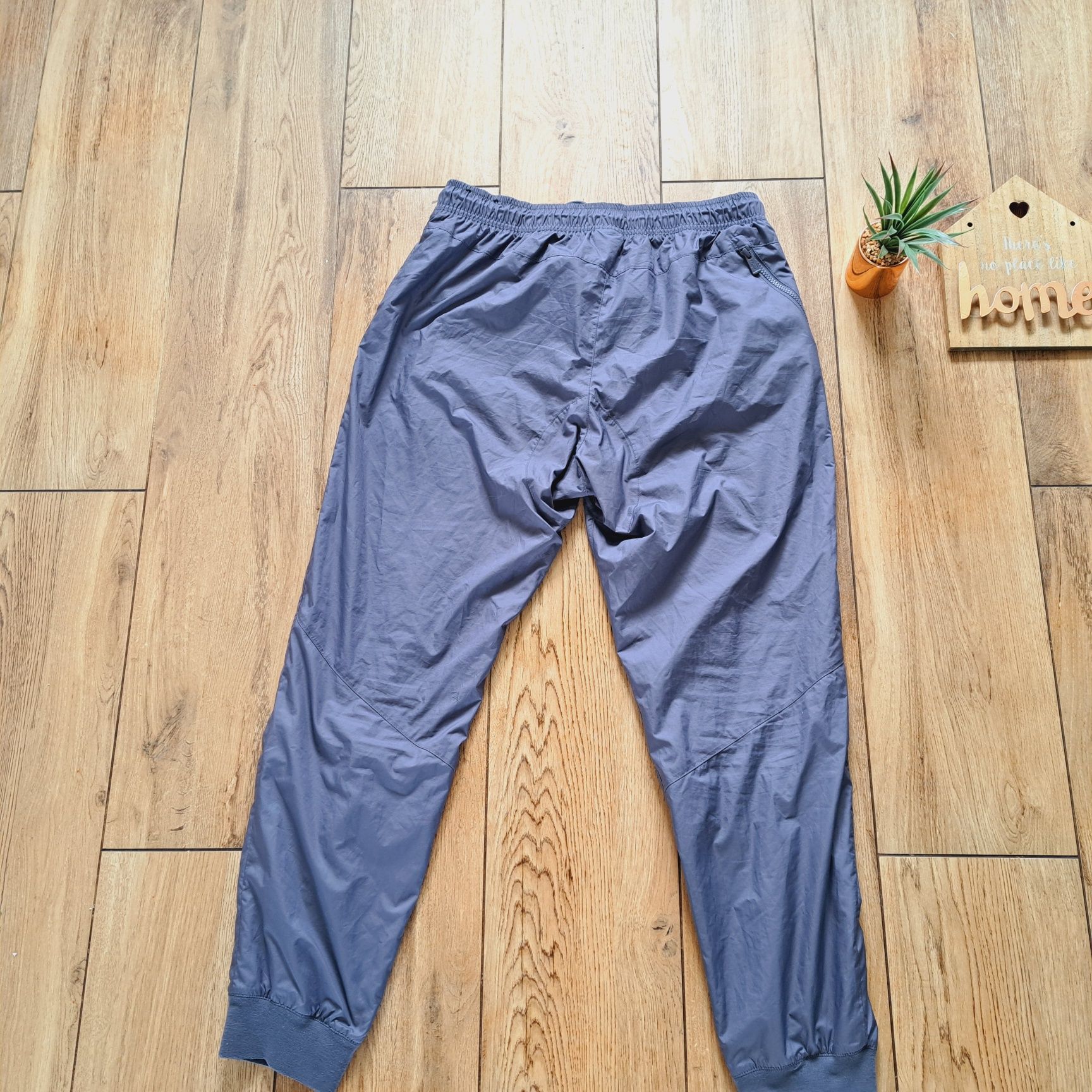 Spodnie Nike Wind running do biegania sportowe