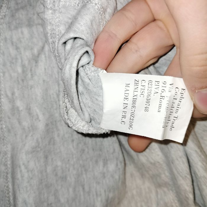 Koszulka dziewczęca z wesołym kotkiem asymetryczna 140 cm.