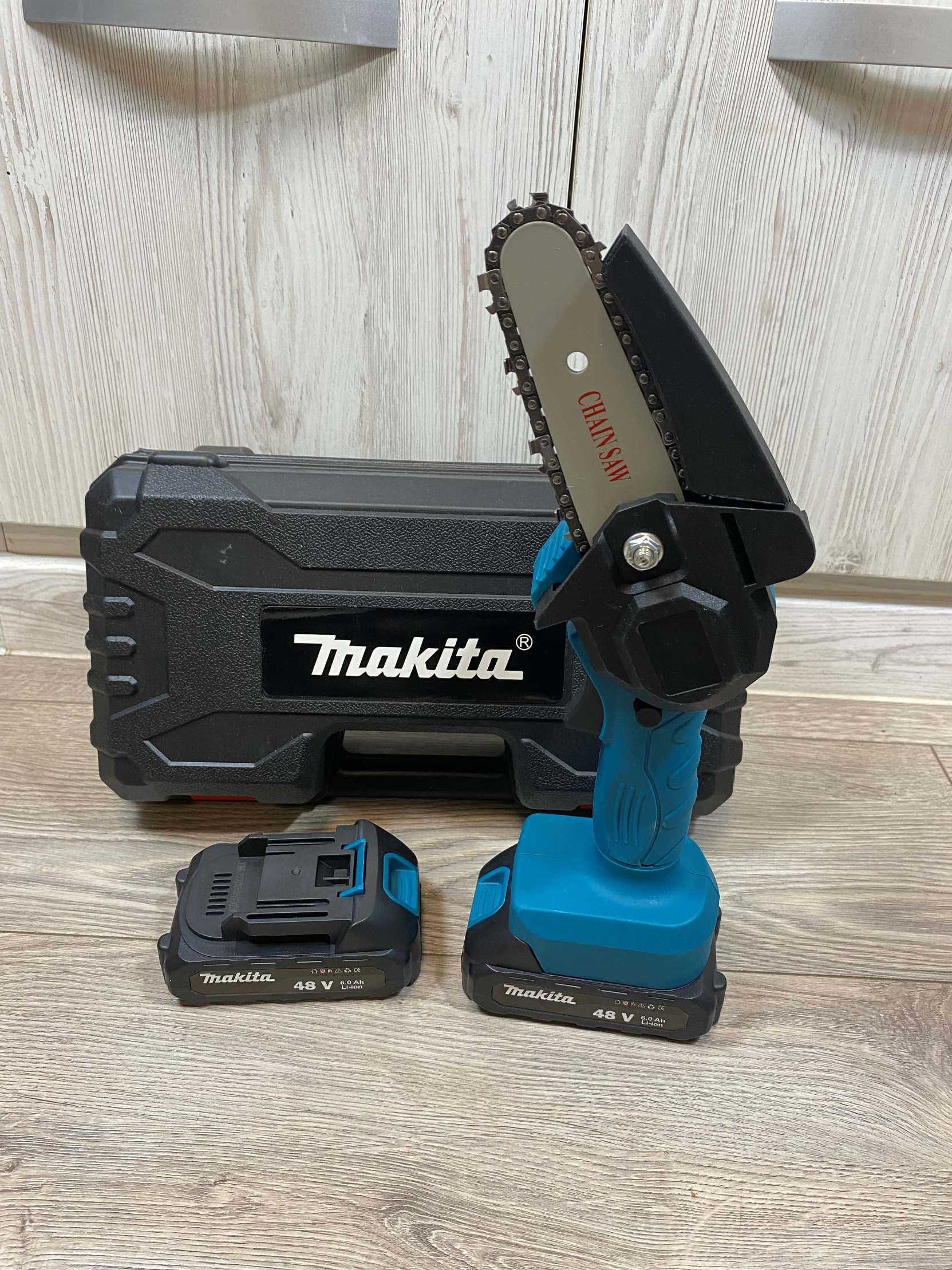 Makita цепная пила аккумуляторная 5A 48V шина 10см секатор