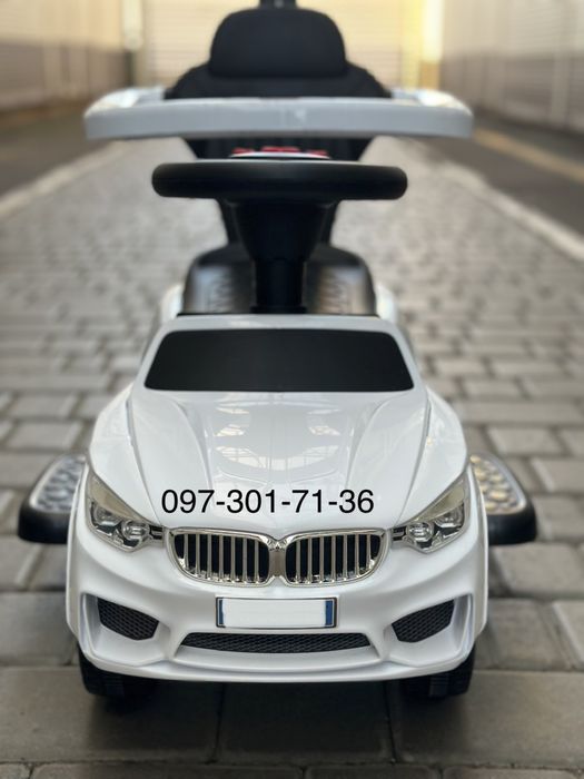Толокар с ручкой поворотной БМВ музыка и свет, скидка!!!