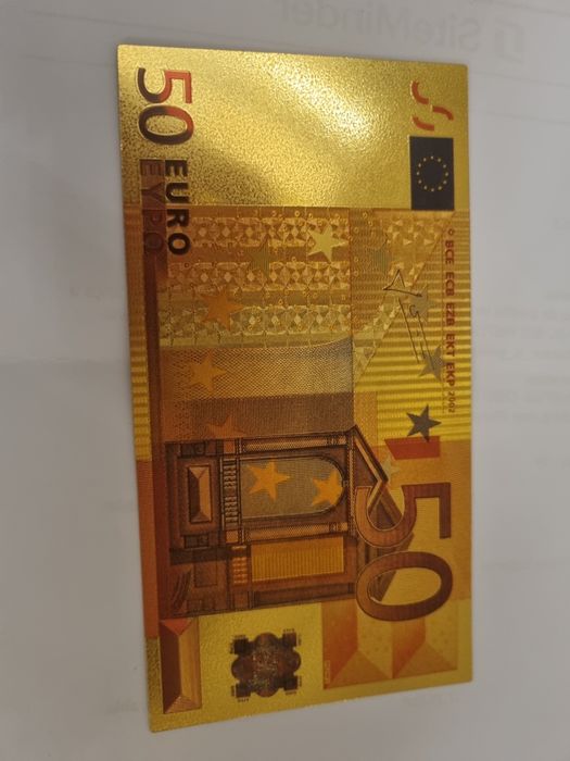 Notaa de colecao douradas