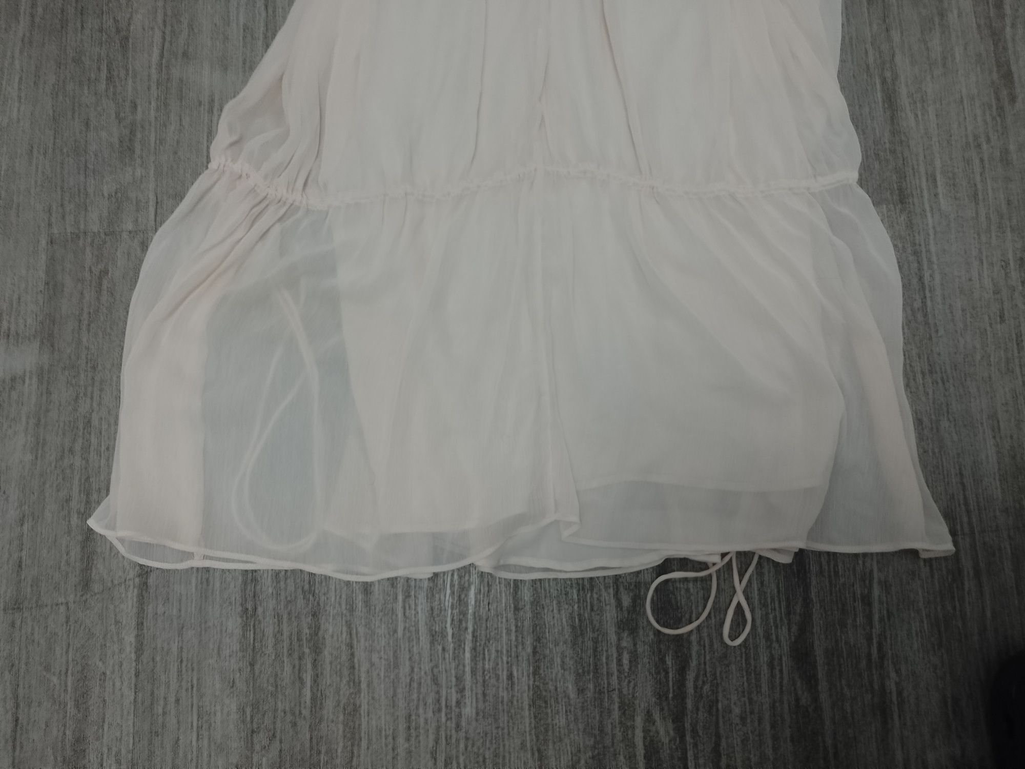 Sprzedam damską bluzkę rozmiar 34 firmy H&M.
