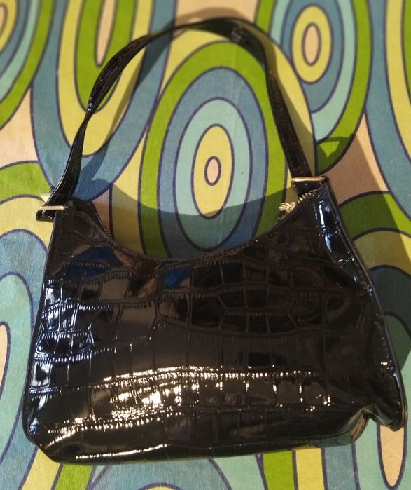 Malas e carteiras novas