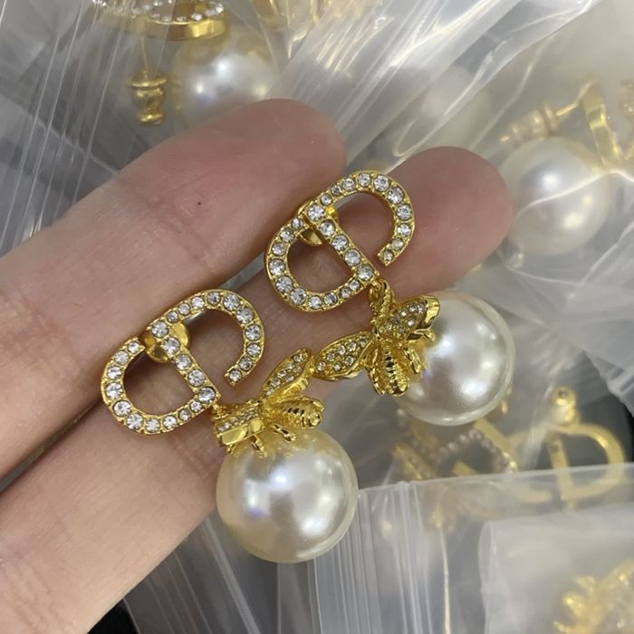 Nowe kolczyki Christian Dior CD stal nierdzewna