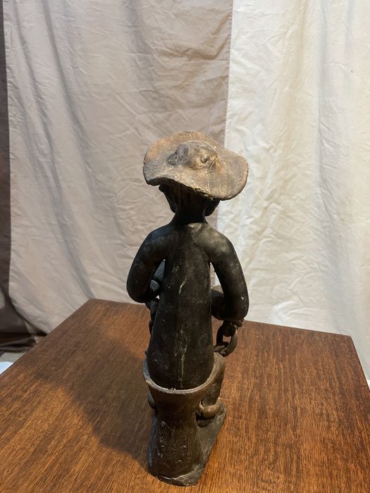 Escultura em barro cozido